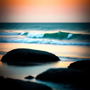 Serene Sunset Over Beach and Sea