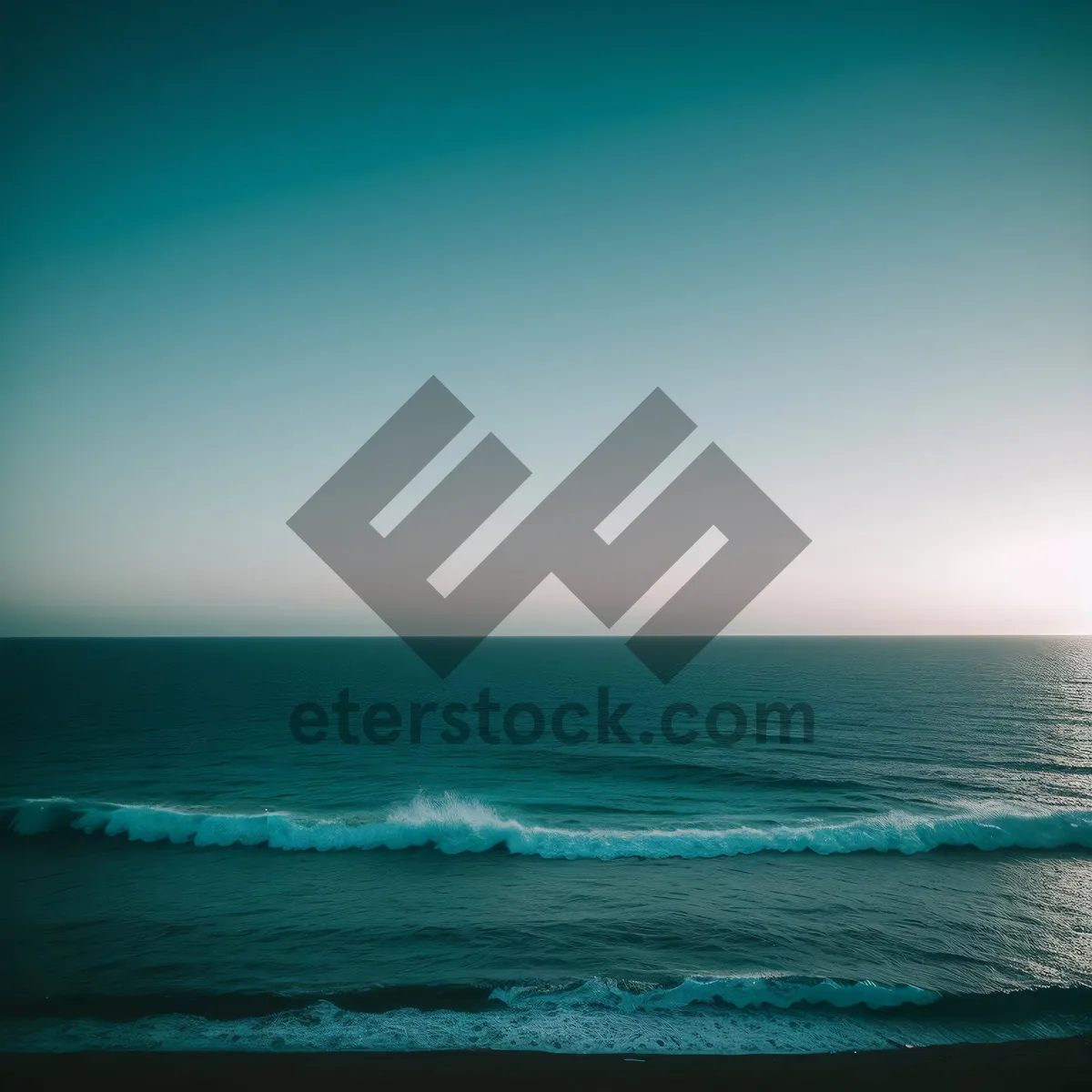 Picture of Serene Shoreline: A Tranquil Beachscape Bathed in Sunlight
