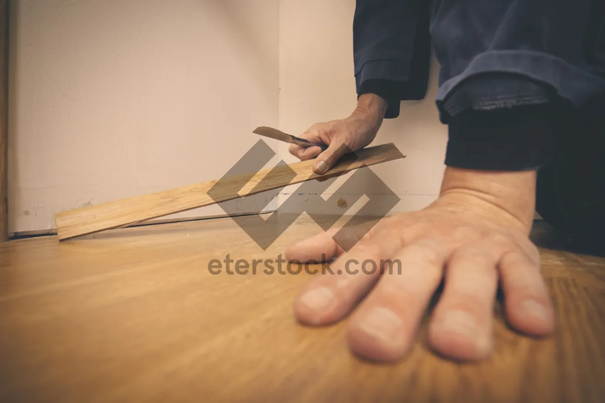 Picture of Busy businessman writing with a pen in office