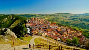 Ancient church in city landscape.