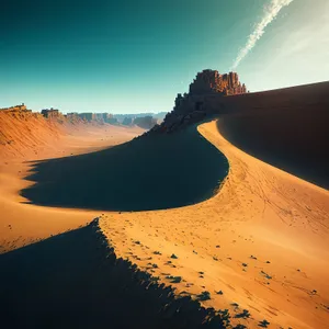 Sunset over Desert Dunes: A Majestic Horizon