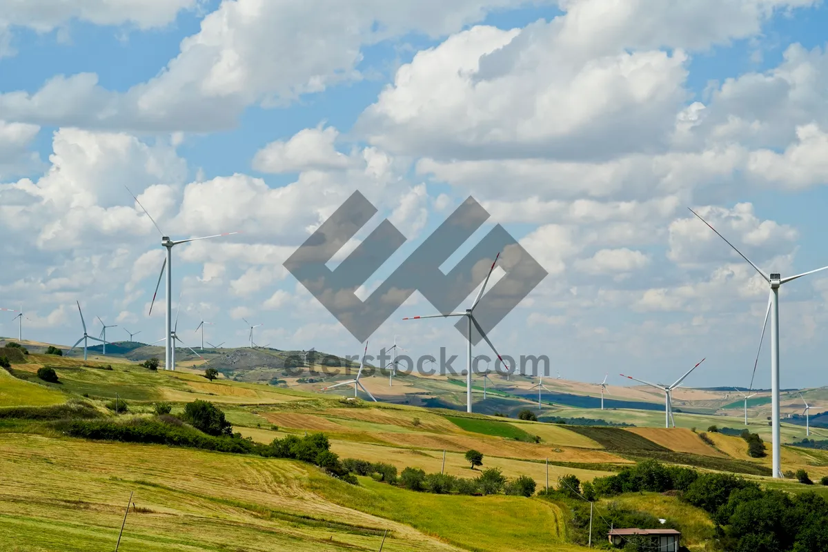 Picture of Wind turbine generating power in rural countryside field