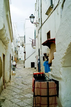 Old stucco building in ancient city street.