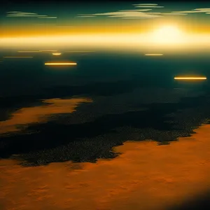 Ocean sunset silhouette with celestial body reflection on water.