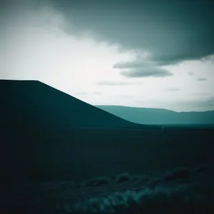 Mesmerizing Desert Sunset over Majestic Mountains