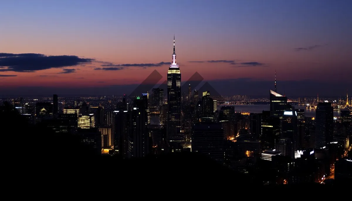 Picture of City skyline at night reflecting on river