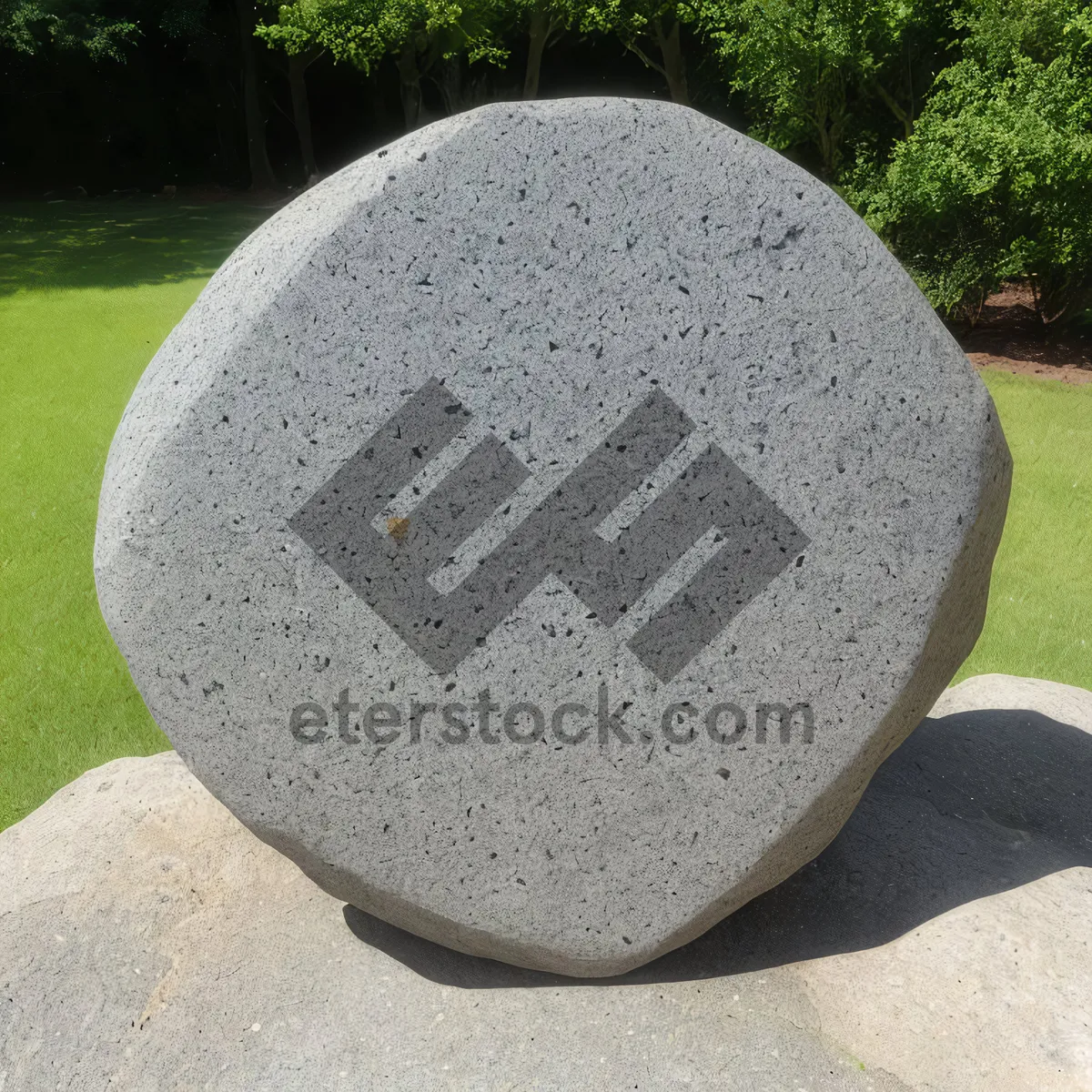 Picture of Golf Ball on Stone Seat in Resort Area