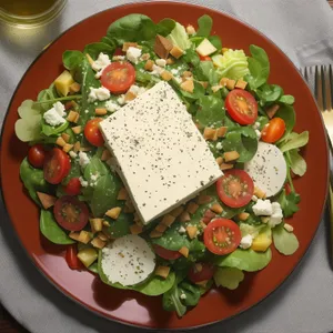 Delicious Gourmet Salad with Fresh Vegetables and Cheese