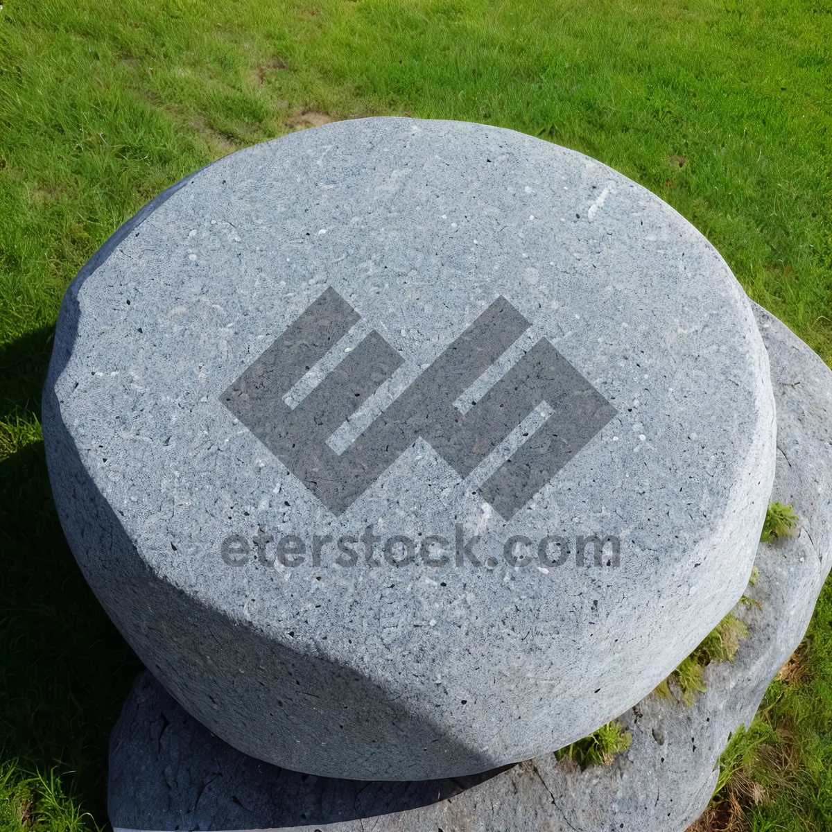 Picture of Golf Ball on Grass with Stone Memorial