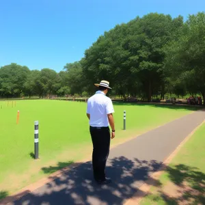 Golf Swing on Green Fairway