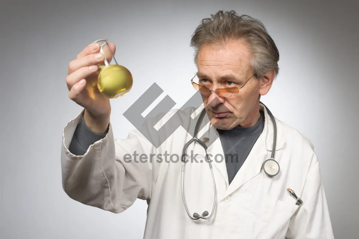 Picture of Senior Male Doctor in Medical Uniform with Stethoscope