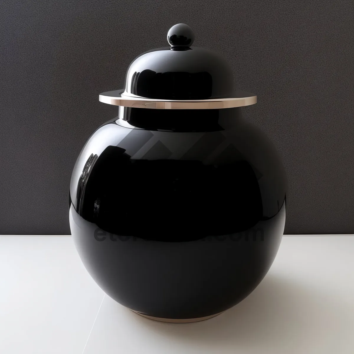 Picture of Traditional Teapot: Exquisite vessel for brewing aromatic tea.