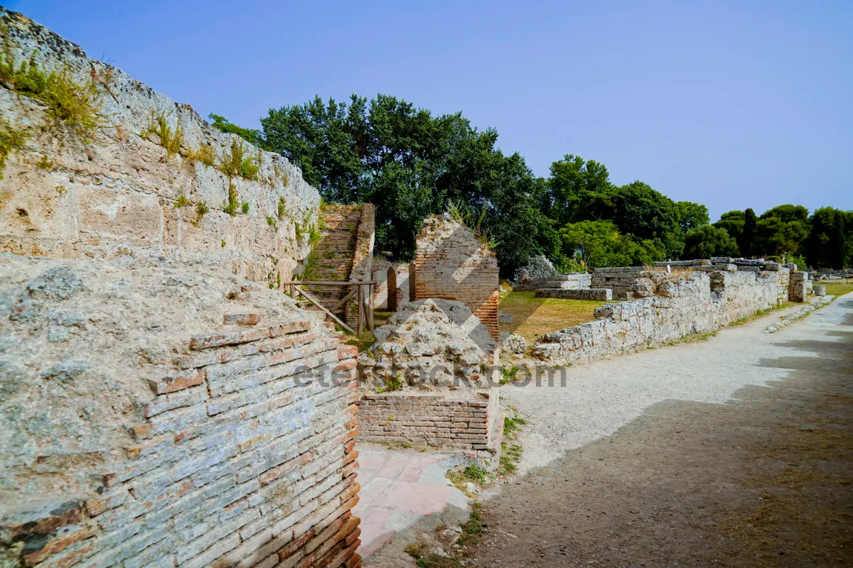 Picture of Ancient castle ruins against a dramatic sky landscape.