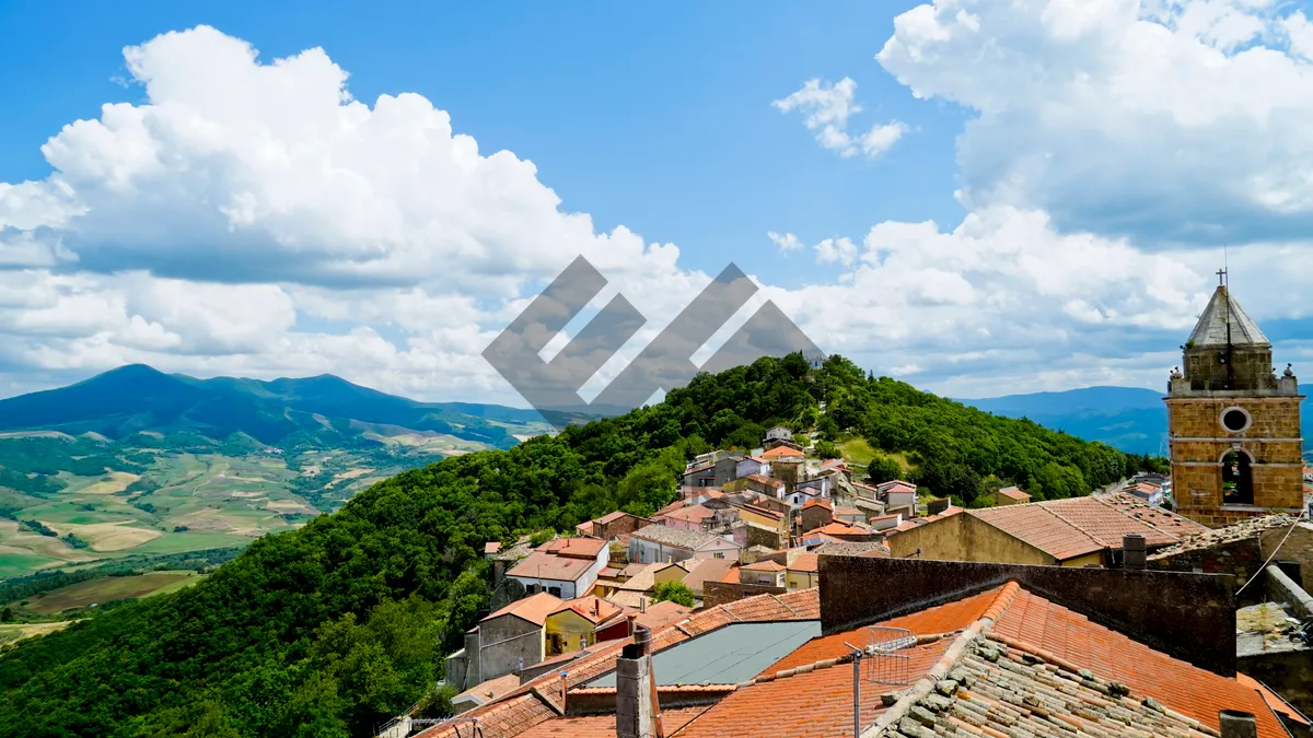 Picture of Historic church building in picturesque mountain village landscape.