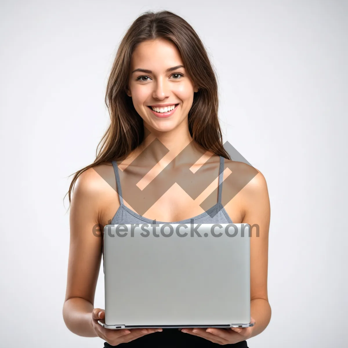 Picture of Attractive businesswoman smiling with laptop in casual setting.