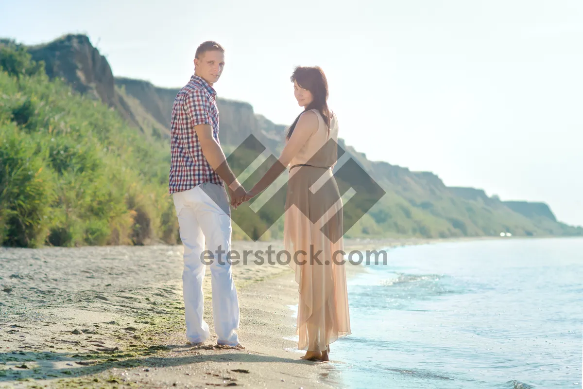 Picture of Happy Couple Enjoying Beach Vacation Summer Fun