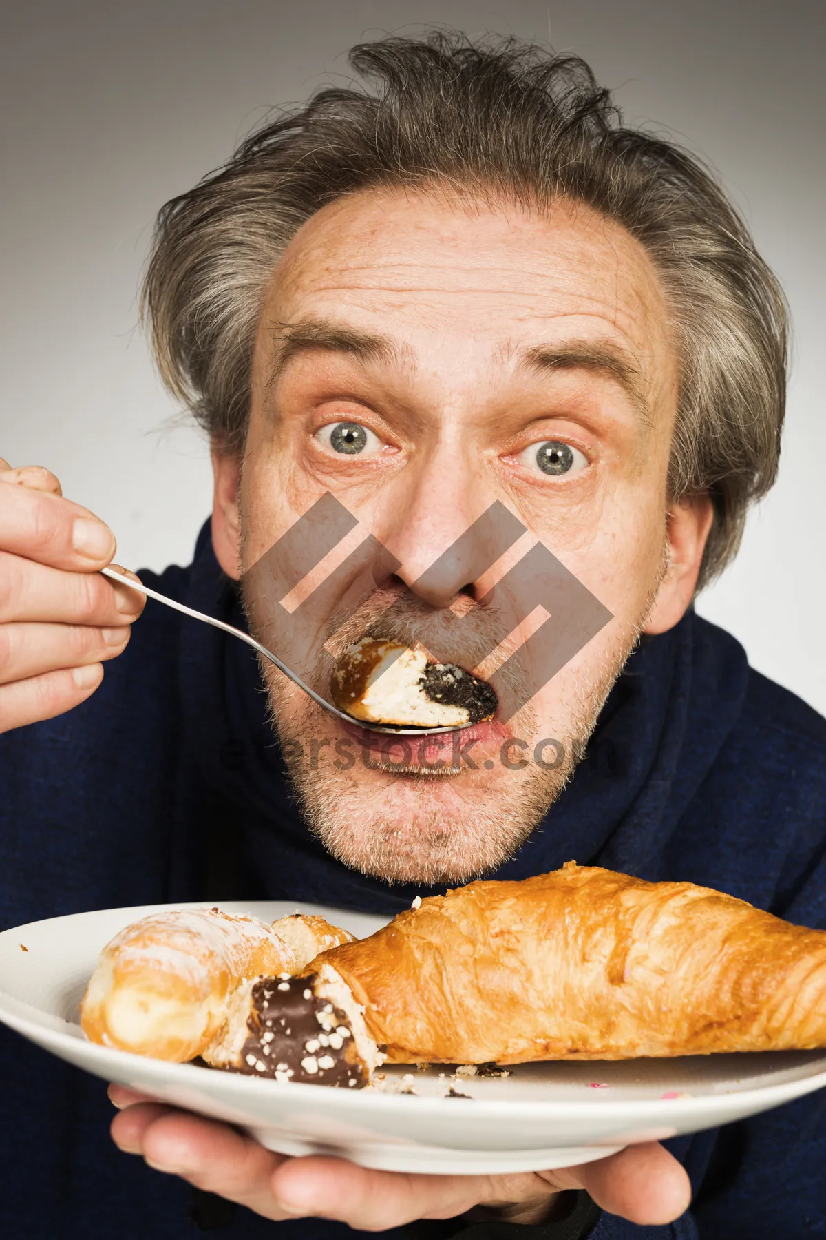 Picture of Happy senior couple enjoying dinner together at home.