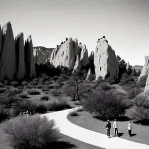 Majestic Snow-Covered Megalith in Serene Cemetery Landscape