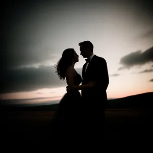 Romantic Sunset Silhouette of Newlywed Couple