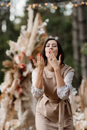 Happy woman with phone in park