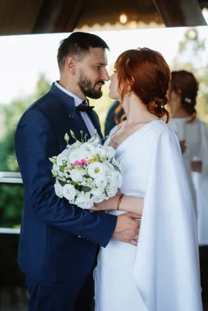 Happy married couple smiling on wedding day