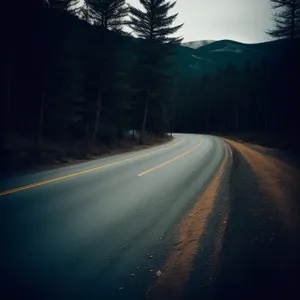 Scenic Highway Bend with Mountainous Landscape