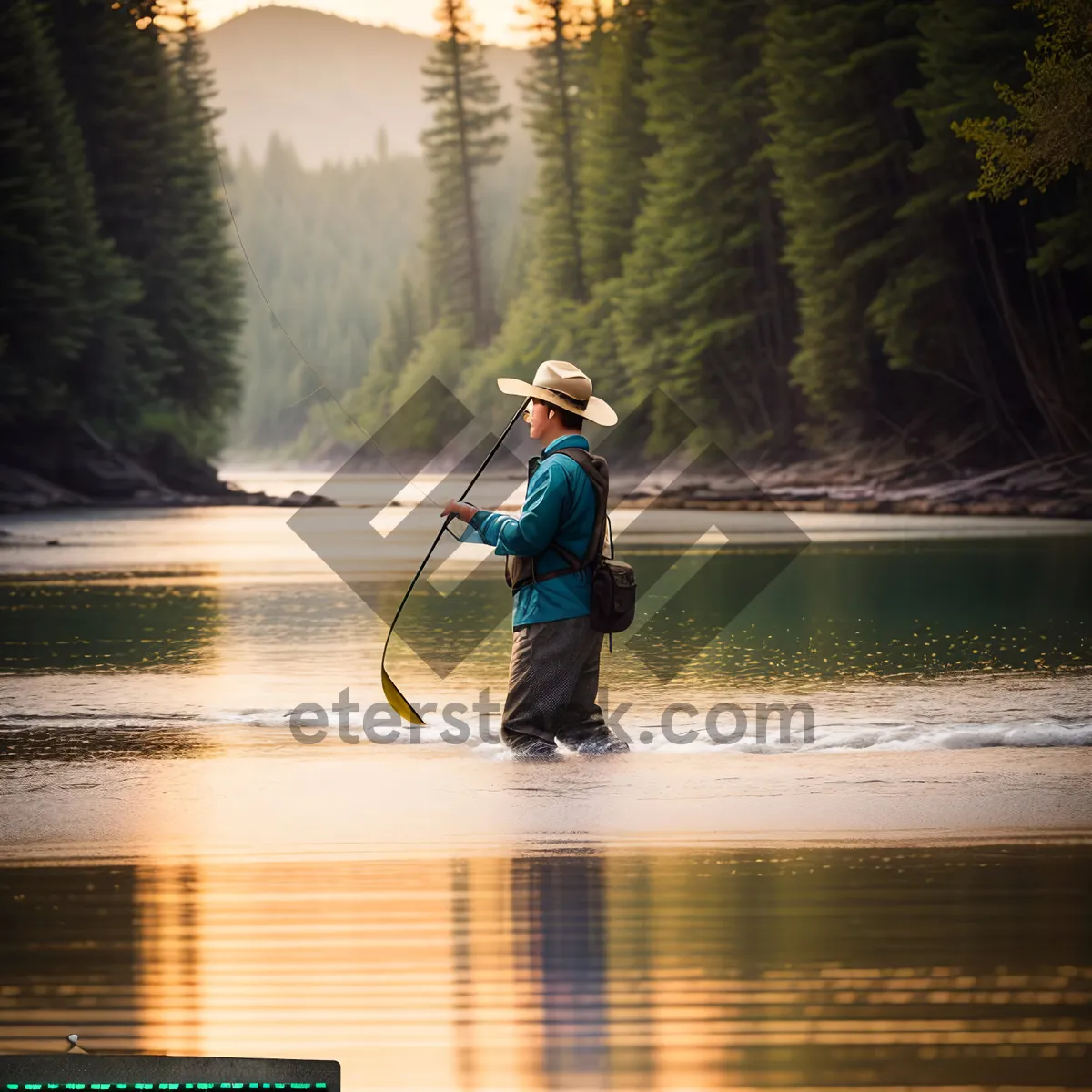 Picture of Fisherman Paddling on Tranquil River at Sunset