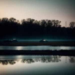 Tranquil Lakeside Scenery with Reflecting Trees