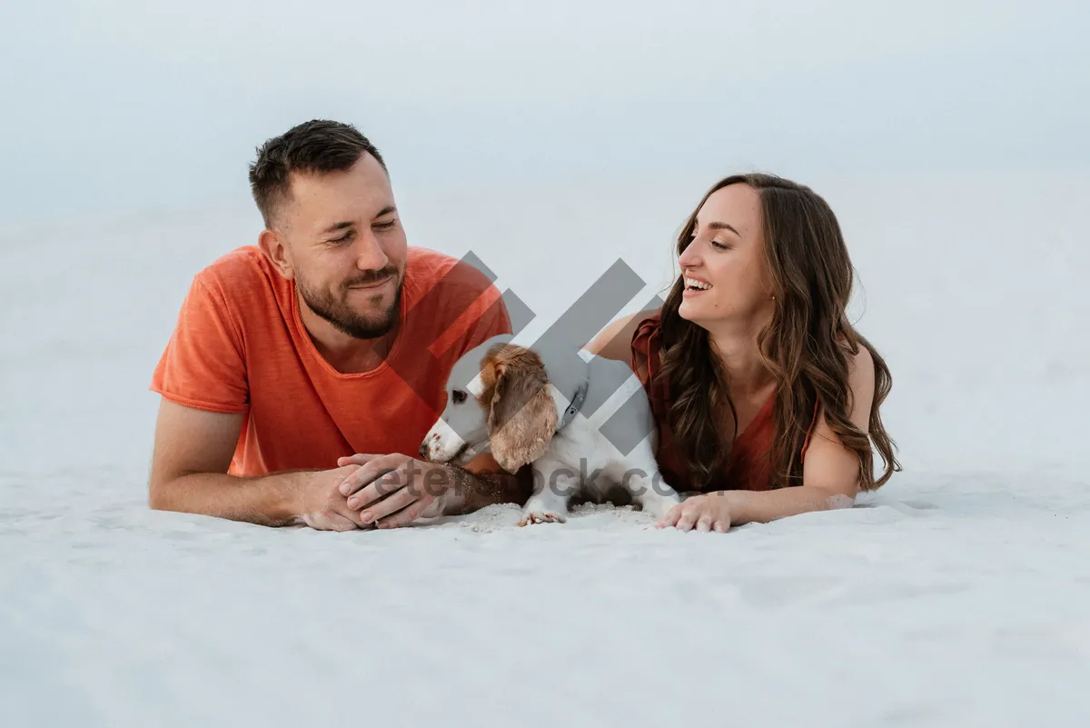 Picture of Happy man with cute cocker spaniel puppy.