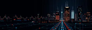 Modern city skyline at night with light streaks.