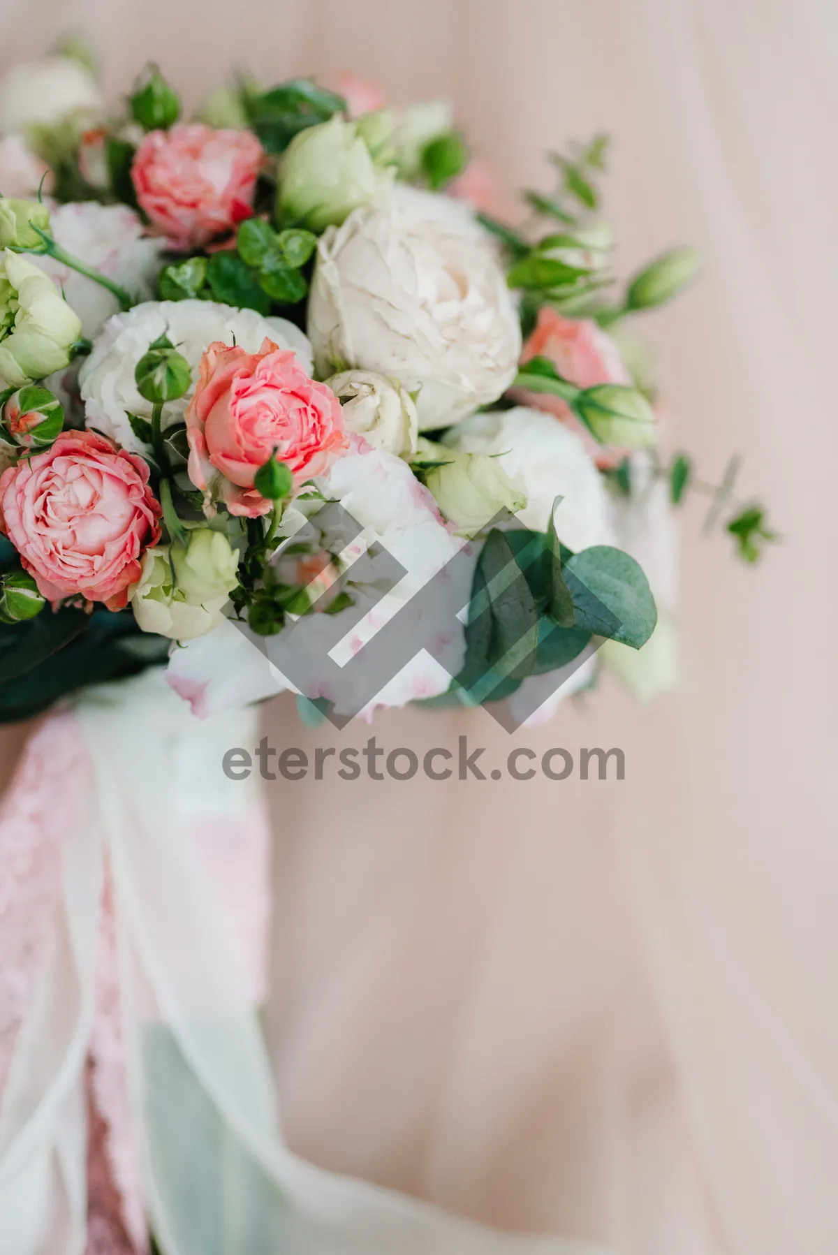 Picture of Romantic pink rose bouquet for wedding celebration.