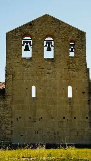 Historical fortress tower overlooking old medieval town and sky castle