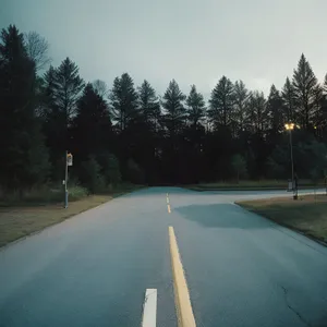 Scenic Drive through Mountainous Forest with Open Road