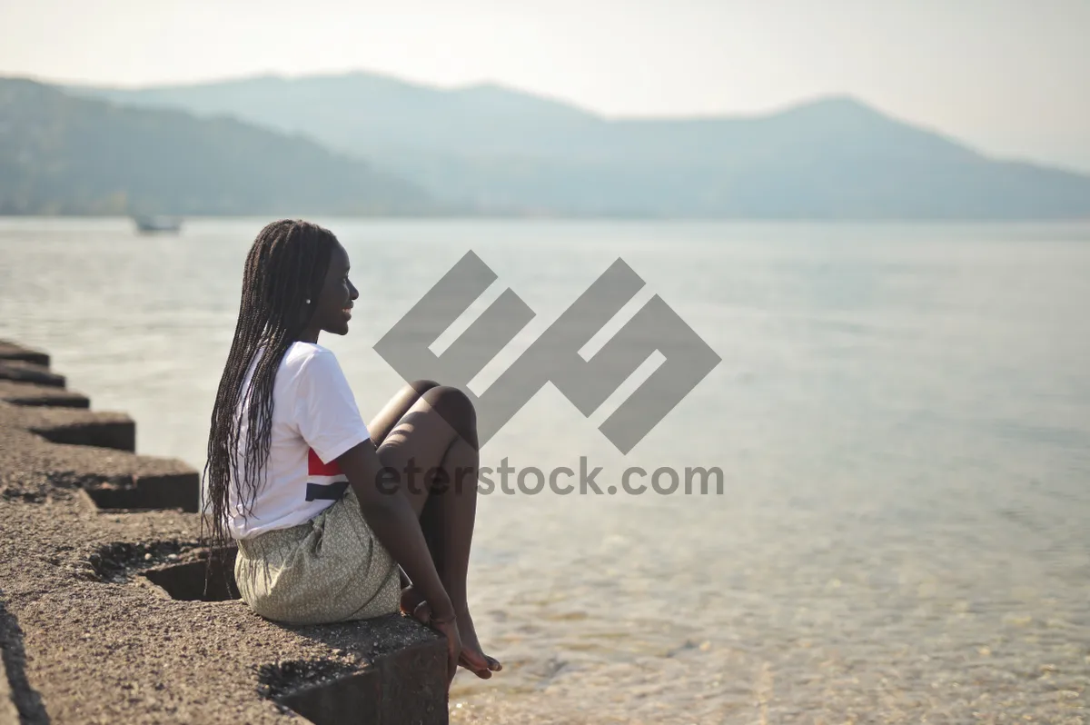 Picture of Happy couple enjoying sunset on beach.