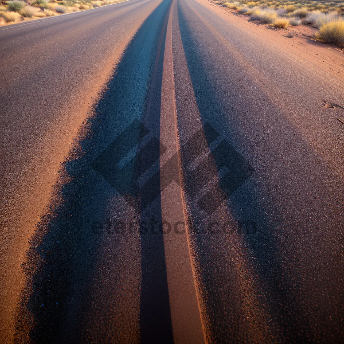 Picture of Desert Highway: Endless Motion Across Sand Dunes.