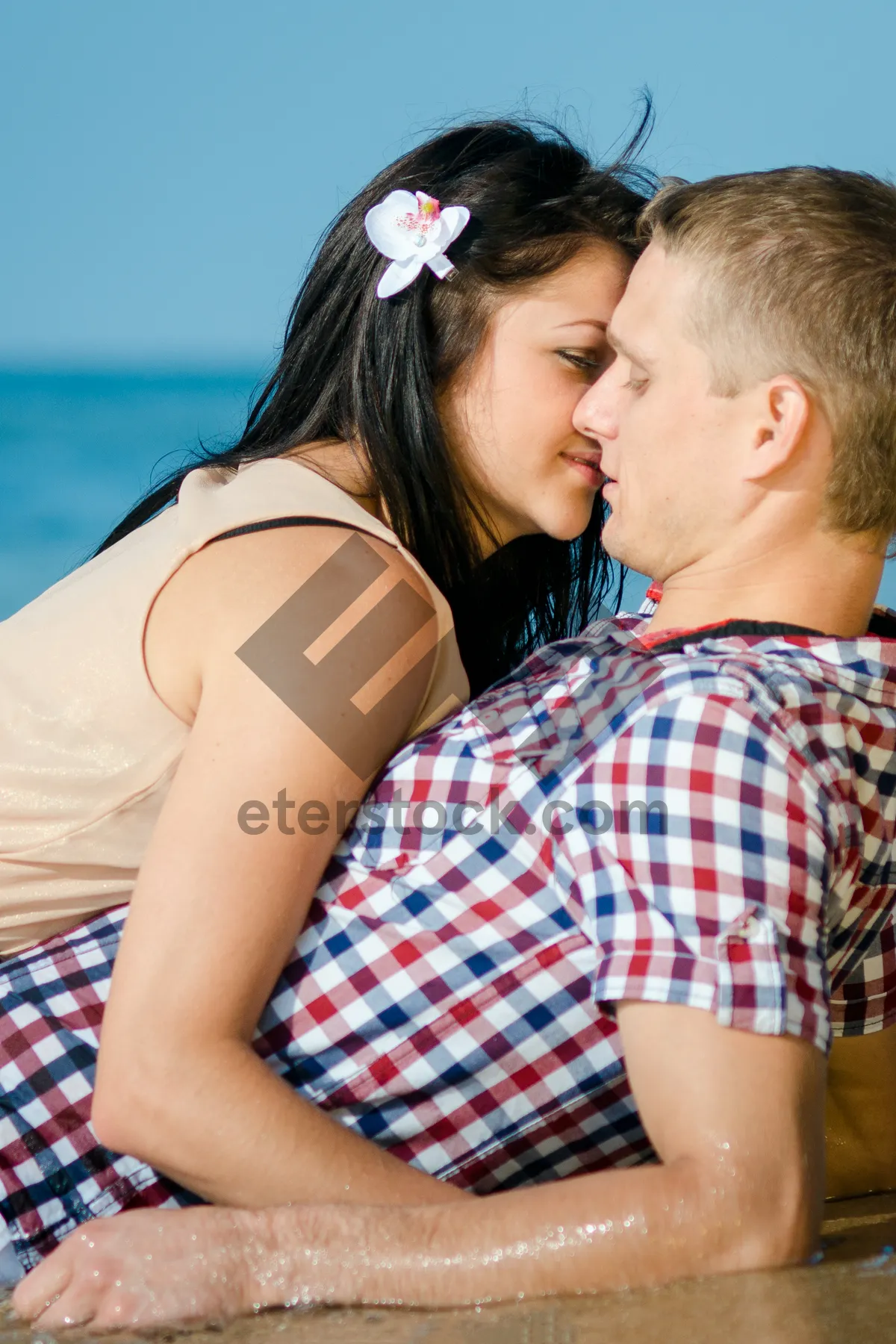 Picture of Attractive couple enjoying summer beach vacation together.