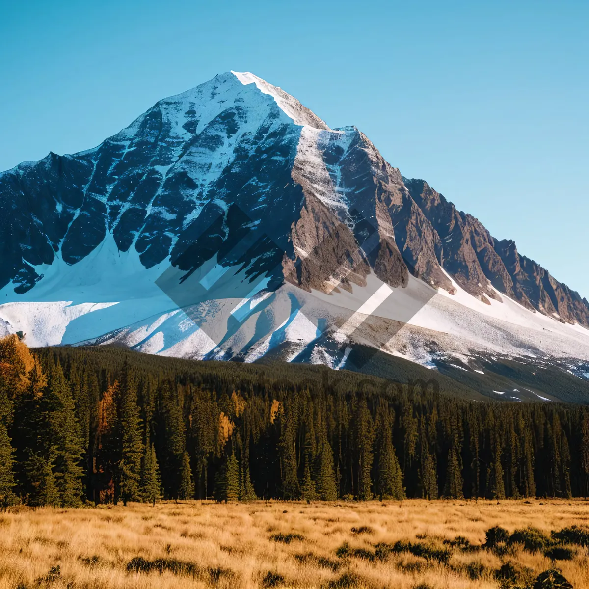 Picture of Majestic Snow-Capped Mountain Range Amidst Serene Wilderness