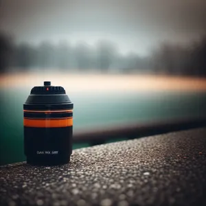 Sunset Serenity: Water Bottle by the Sea