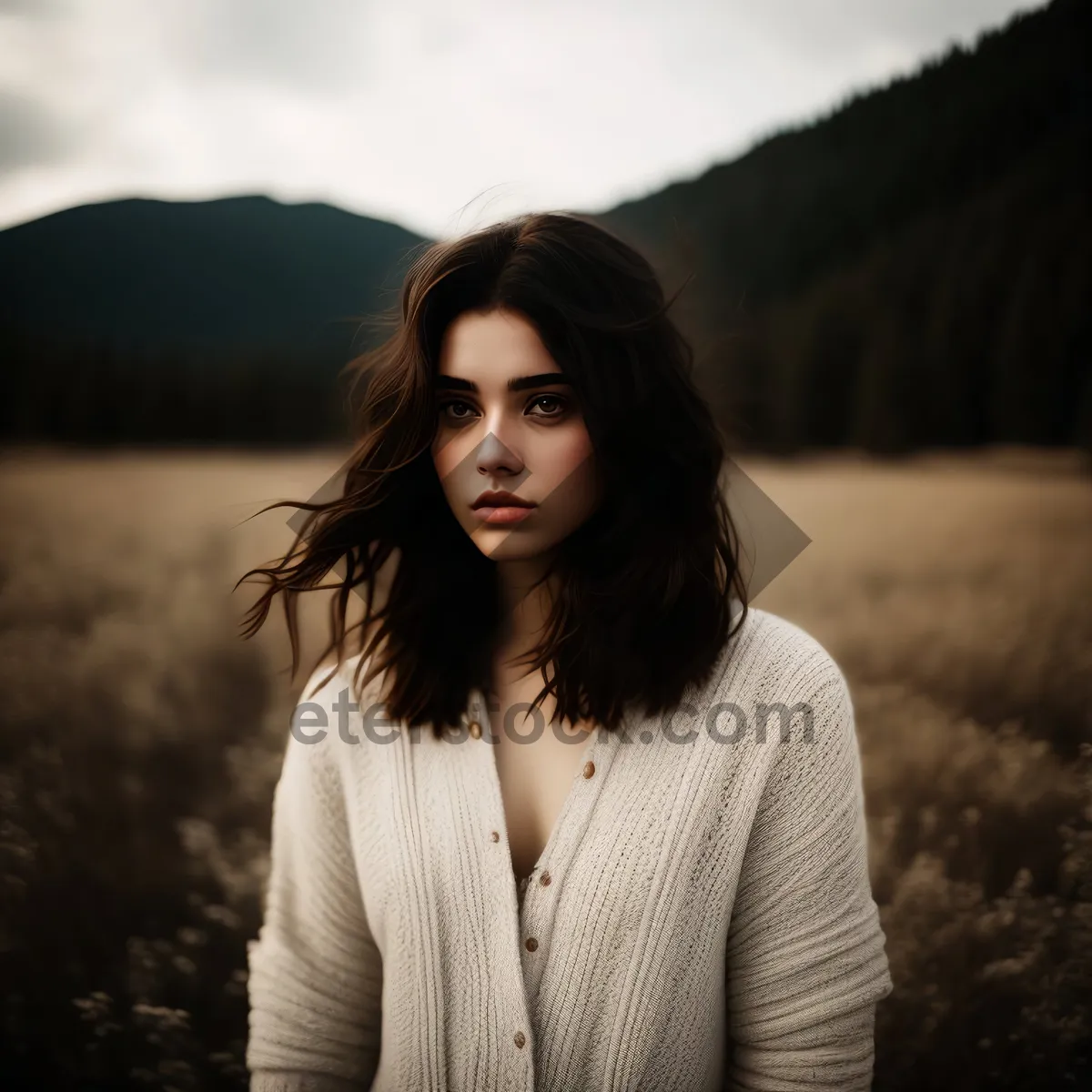 Picture of Attractive brunette businesswoman smiling in casual fashion portrait.