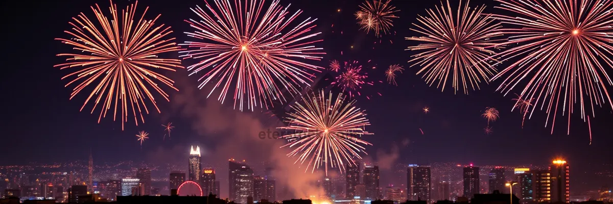 Picture of Nighttime Firework Display in Black Sky with Bright Stars.