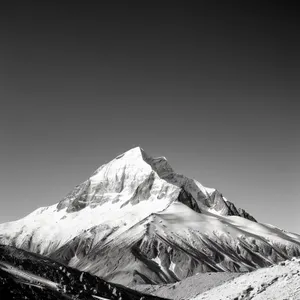 Majestic snow-capped mountain range in winter landscape