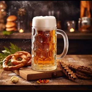 Beer glass on party table with foam.