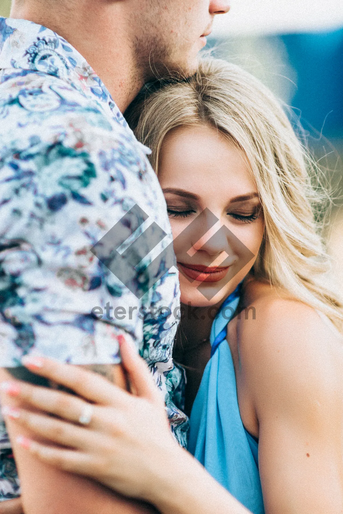 Picture of Happy blond woman in cozy pajamas smiling