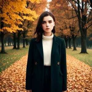 Stylish Smiling Brunette Fashion Model in Autumn Park