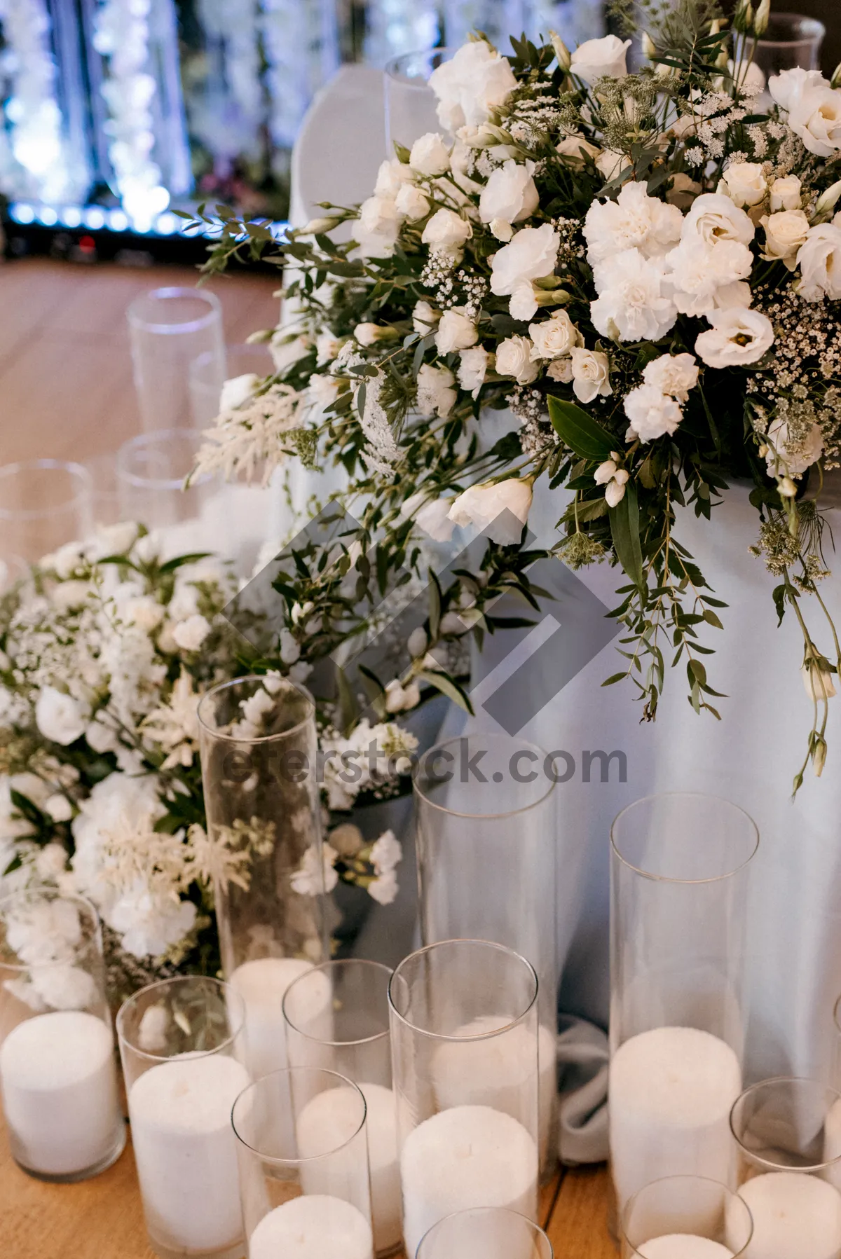 Picture of Wedding flower bouquet in glass vase on table