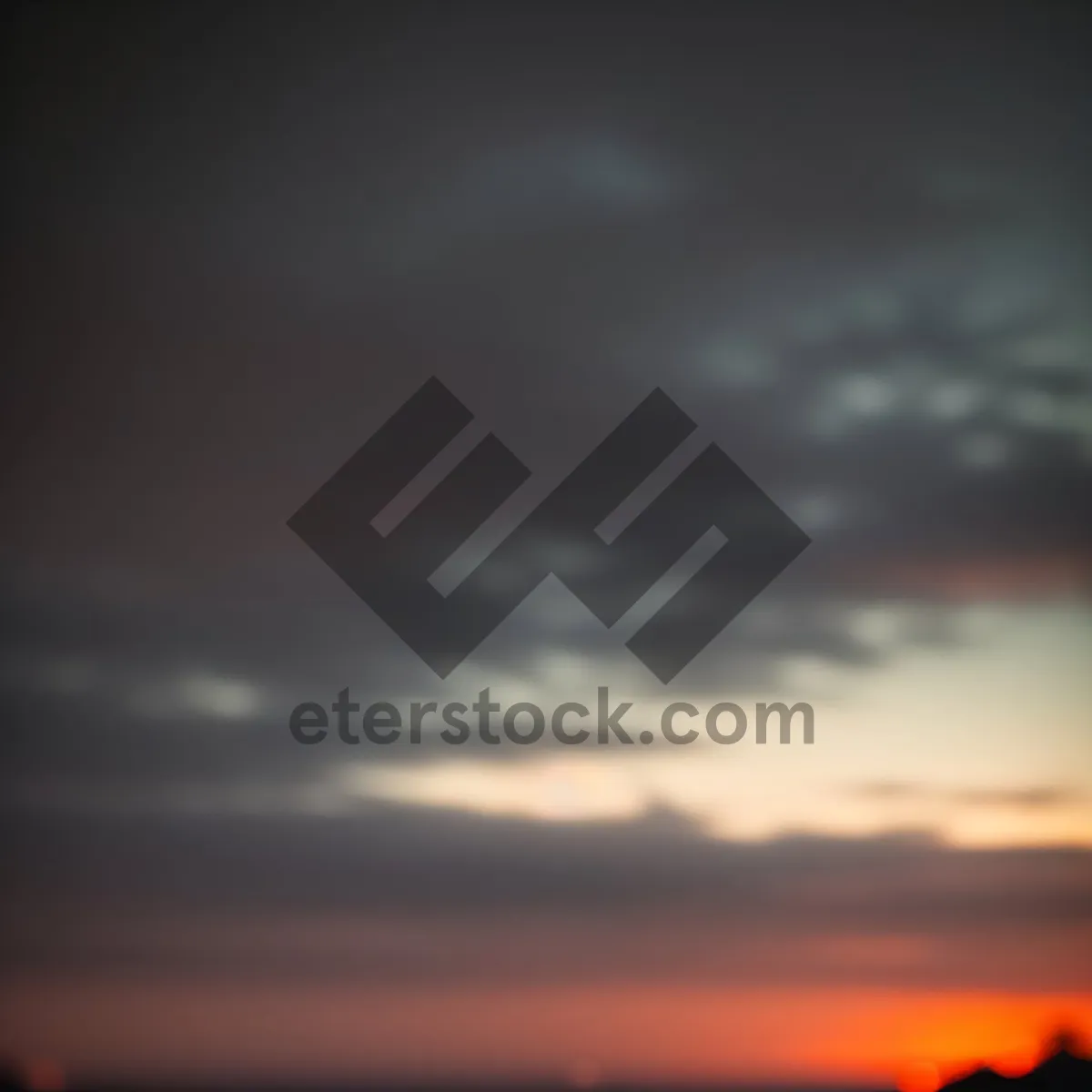 Picture of Vibrant Horizon: Sun-kissed cloudscape at sunset.