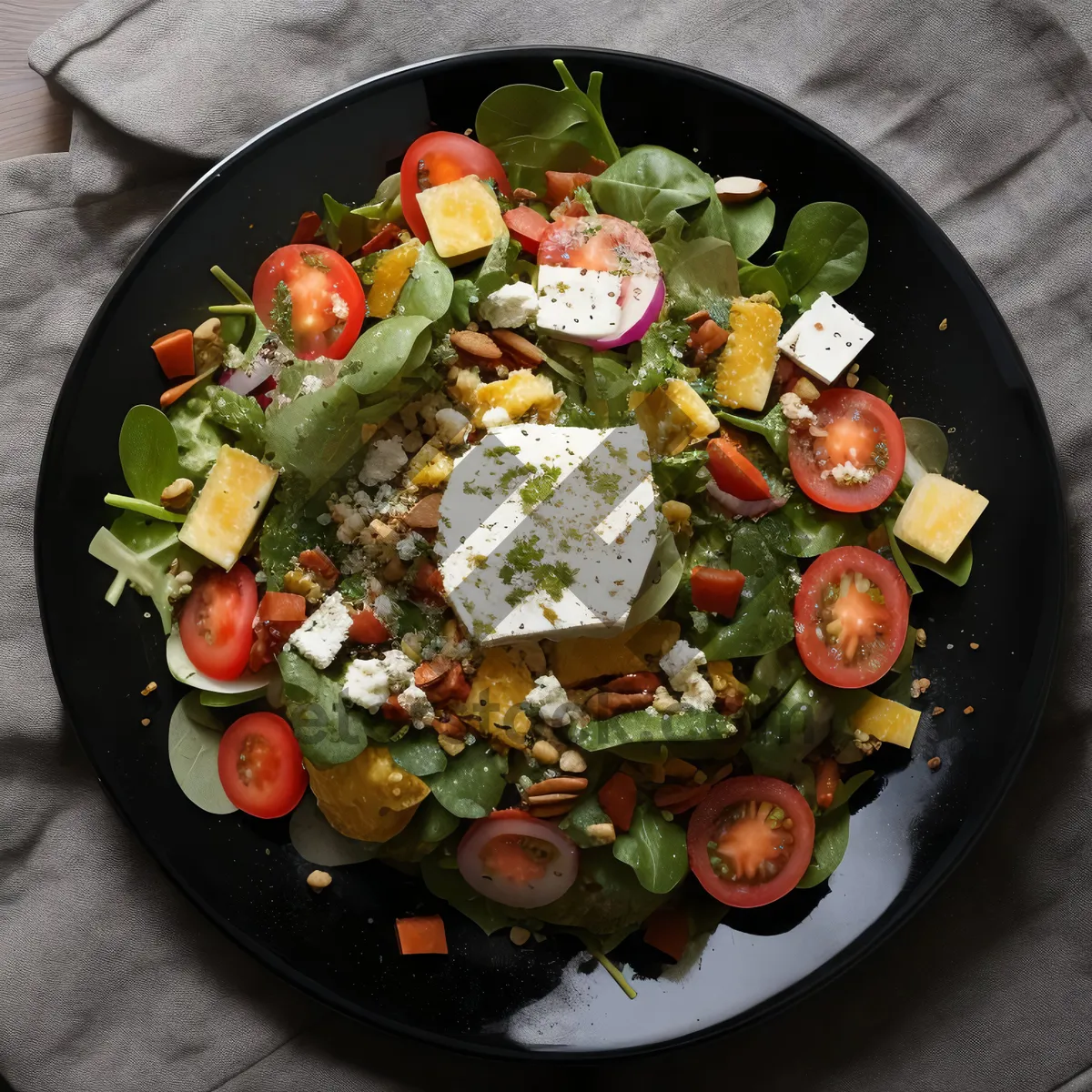 Picture of Gourmet salad plate with grilled vegetables and cheese.