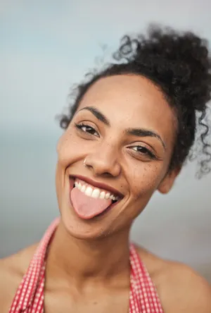 Attractive Woman with Flawless Makeup Smiling Happily