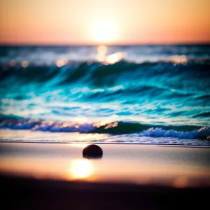 Coastal Sunset Reflection on Ocean Beach