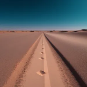 Endless Desert Dunes beneath the Sun